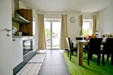 Attraktive 2 Zi.-Wohnung mit Fußbodenheizung, Lift und 2 Balkone - Küche ohne EBK mit Zugang zum West-Balkon